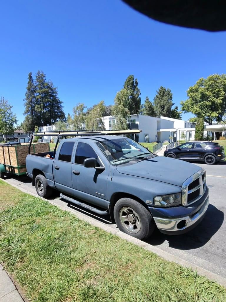 Clear Path Solutions truck and trailer loaded for a Fremont junk removal job